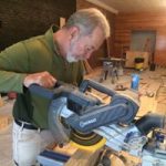 Tom Nelson, DVM working on NEABA building