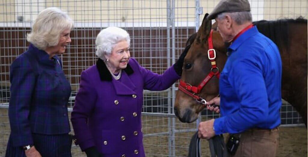 Left: Queen Consort Camilla, Her Majesty Queen Elizabeth II, and Monty Roberts following a demonstration session | Photo: MontyRoberts.com