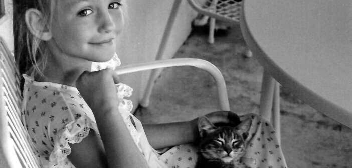 Jen Reeder and her childhood cat Fluff