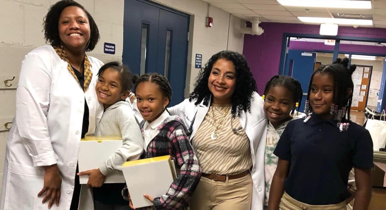 Drs. Bruno and Perkins-Glover at a pipeline event with students.